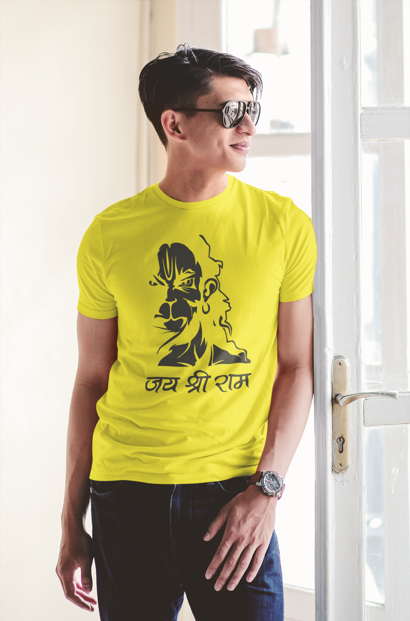 t-shirt-mockup-of-a-man-with-sunglasses-standing-by-a-window-43328-r-el2