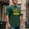 UuJLgZ78_LEO5OJ3F8P_2026-04-17_1.jpg Mens Oversized Dark Green Graphic Printed Round Neck T-Shirt Bold Smash Artwork, Casual Streetwear, Half Sleeve Premium Cotton Tee