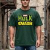 UuJLgZ78_NGG3CF5G2C_2026-04-17_2.jpg Mens Oversized Dark Green Graphic Printed Round Neck T-Shirt Bold Smash Artwork, Casual Streetwear, Half Sleeve Premium Cotton Tee