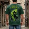 UuJLgZ78_VRNCHRRHBQ_2026-04-17_1.jpg Mens Oversized Dark Green Graphic Printed Round Neck T-Shirt Bold Smash Artwork, Casual Streetwear, Half Sleeve Premium Cotton Tee