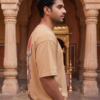 5QCvnsCp_AQPHXU0GN6_2026-05-08_3.png Unisex Oversized Hanuman Warrior Graphic T-Shirt Bold Devotion Design, Beige Cotton Tee