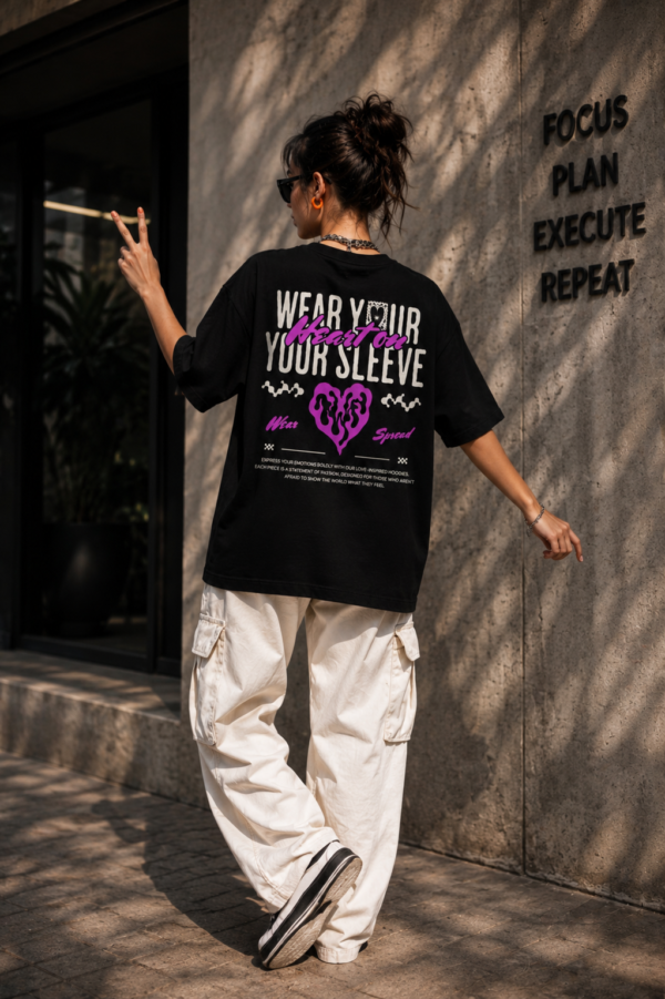 Women's Black Oversized Graphic T-Shirt Wear Your Heart on Your Sleeve Back Print | Premium Loopknit 240 GSM Cotton | Bold Pink & White Typography Design | Casual Streetwear Round Neck Tee for Daily Wear