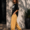 Women's Black Oversized Graphic T-Shirt with DARK Typography & Eye Print | Trendy Streetwear Casual Tee | Soft Cotton Relaxed Fit Fashion Top