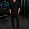 Men's Oversized Black Graphic Printed T-Shirt | Warrior Omega Back Print | Half Sleeve Round Neck | Premium Cotton Streetwear