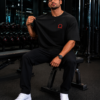 Men's Oversized Black Graphic Printed T-Shirt | Warrior Omega Back Print | Half Sleeve Round Neck | Premium Cotton Streetwear