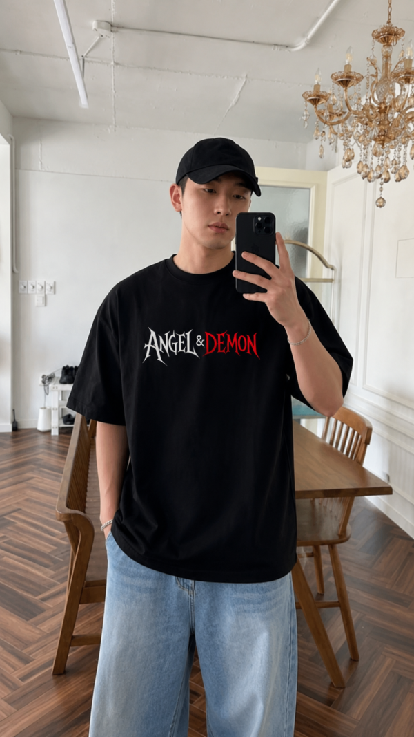 ChatGPT Image Jul 22, 2026, 12_19_05 PM Men Oversized Black T-Shirt with Angel & Demon Graphic Print | Premium Loopknit 240 GSM Cotton | Half Sleeve Round Neck Streetwear Tee | Trendy Back Print Casual Oversized Fit T-Shirt for Men