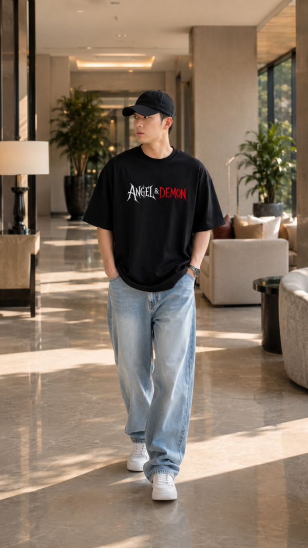 ChatGPT Image Jul 22, 2026, 12_21_10 PM Men Oversized Black T-Shirt with Angel & Demon Graphic Print | Premium Loopknit 240 GSM Cotton | Half Sleeve Round Neck Streetwear Tee | Trendy Back Print Casual Oversized Fit T-Shirt for Men