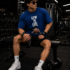 ChatGPT Image Jul 30, 2026, 02_29_59 PM Men’s Navy Blue Oversized Gym T-Shirt – “Gym Is Life” Muscle Back Design | 240 GSM Cotton | DTF Print