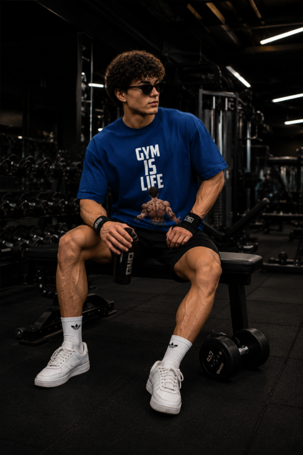 ChatGPT Image Jul 30, 2026, 02_29_59 PM Men’s Navy Blue Oversized Gym T-Shirt – “Gym Is Life” Muscle Back Design | 240 GSM Cotton | DTF Print