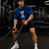 ChatGPT Image Jul 30, 2026, 02_37_31 PM Men’s Navy Blue Oversized Gym T-Shirt – “Gym Is Life” Muscle Back Design | 240 GSM Cotton | DTF Print