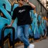 ChatGPT Image Jul 30, 2026, 02_45_19 PM Men’s Oversized Black Rebel T-Shirt – Loopknit Cotton 240 GSM with DTF Print Streetwear Style