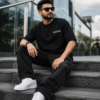 ChatGPT Image Jul 31, 2026, 02_25_56 PM Mens Oversized Black Anime Warrior Graphic T-Shirt | Dark Manga Back Print | Premium Loopknit Cotton 240 GSM | Japanese Streetwear Style Tee
