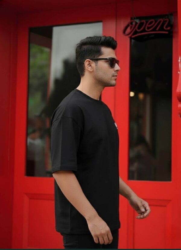 Men Black Oversized Graphic T-Shirt with Crown Front Detail and Bold Tech-Inspired Back Print Streetwear Style
