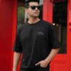 Men Black Oversized Graphic T-Shirt with Crown Front Detail and Bold Tech-Inspired Back Print Streetwear Style
