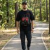 God of War Kratos Oversized T-Shirt, Cap & Drawstring Bag Combo for Men | Gaming Inspired Streetwear Set | Loopknit 240 GSM Cotton Tee + Adjustable Cap + Printed Carry Bag