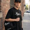 Rebel Graphic Oversized T-Shirt, Cap & Drawstring Bag Combo for Men | Streetwear Statement Set | Loopknit 240 GSM Cotton Tee + Adjustable Cap + Premium Carry Bag
