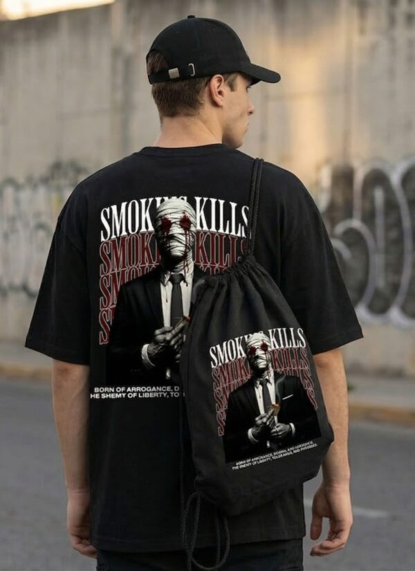 Black Oversized Graphic T-Shirt with Bold Typography Print and Back Artwork Design Paired with Matching Adjustable Cap and Printed Drawstring Bag Combo Set Streetwear Casual Outfit