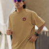 WMFOC_Rustom_1768043778236_vmr6pg26yeb9y3z.jpg Camel Brown Bull Graphic Printed Men’s Oversized T-Shirt | Premium Loopknit Fabric 240 GSM | Minimal Front Logo & Bold Back Power Print Streetwear Tee – GiftSpeaks