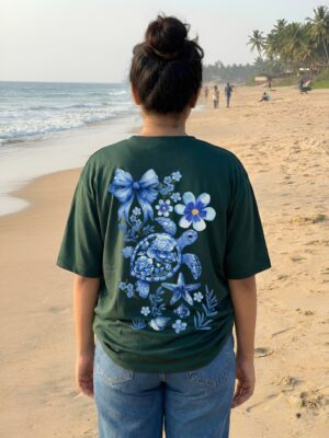 WWFOBG_Tortoise_1770971082483_wg70zns80dbtqeh.jpg Women Oversized Graphic T-Shirt | Blue Floral Turtle Back Print | Loopknit 240 GSM Cotton | Relaxed Fit Drop Shoulder Casual Tee