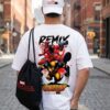 White Oversized Graphic T-Shirt with Front Typography Print and Back Comic Artwork Design Paired with Matching Adjustable Cap and Drawstring Bag Combo Set Streetwear Casual Everyday Outfit