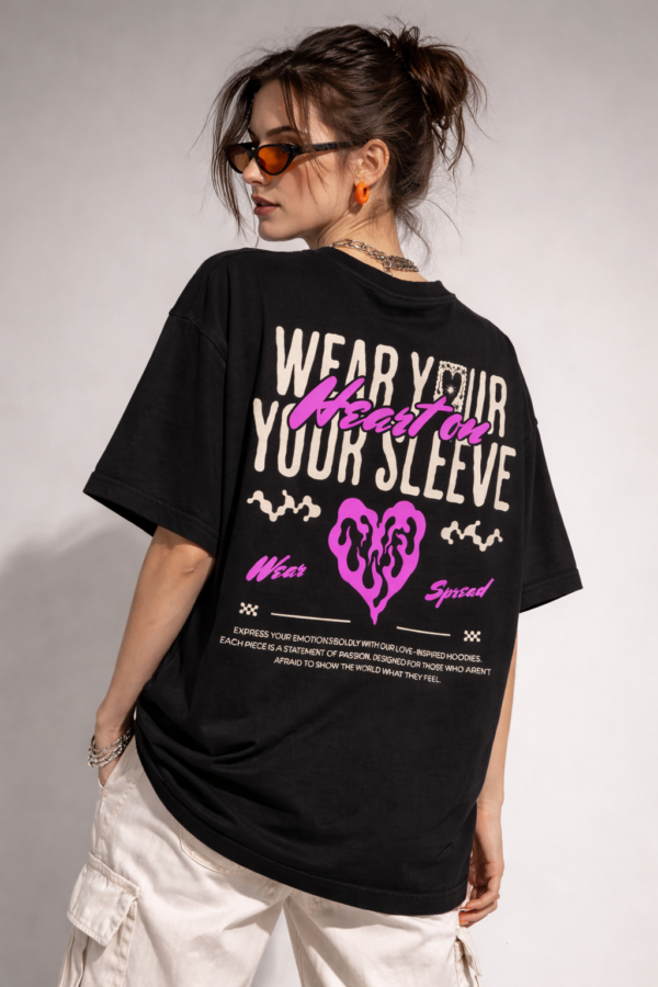 WWFOB_Wear_your_sleeve_1772786839772_28g6j5kkovkdduw.png Women's Black Oversized Graphic T-Shirt Wear Your Heart on Your Sleeve Back Print | Premium Loopknit 240 GSM Cotton | Bold Pink & White Typography Design | Casual Streetwear Round Neck Tee for Daily Wear