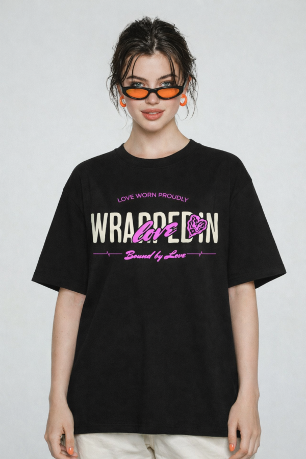 WWFOB_Wear_your_sleeve_1772787430090_ia7yke262vxvpx1.png Women's Black Oversized Graphic T-Shirt Wear Your Heart on Your Sleeve Back Print | Premium Loopknit 240 GSM Cotton | Bold Pink & White Typography Design | Casual Streetwear Round Neck Tee for Daily Wear