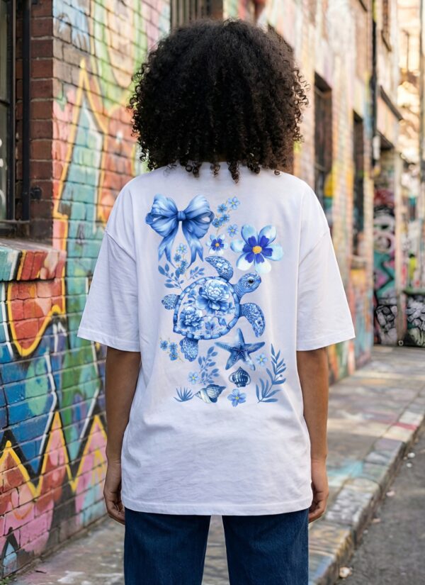 Women Oversized Graphic T-Shirt | Blue Floral Turtle Back Print | Loopknit 240 GSM Premium Cotton | Relaxed Streetwear Fit