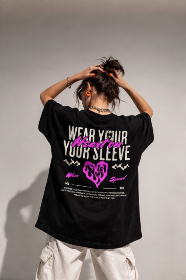 retouch_2026071713591047.jpg Women's Black Oversized Graphic T-Shirt Wear Your Heart on Your Sleeve Back Print | Premium Loopknit 240 GSM Cotton | Bold Pink & White Typography Design | Casual Streetwear Round Neck Tee for Daily Wear