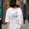 vpwDWj1P_ZFBBOEKS3A_2026-05-25_3.jpg Women's Oversized Butterfly Floral Graphic Printed T-Shirt | Trendy White Aesthetic Typography Baggy Tee for Girls & Women | Casual Drop Shoulder Half Sleeve Round Neck Streetwear Fashion T-Shirt | Loopknit 240 GSM Premium Oversized Fit