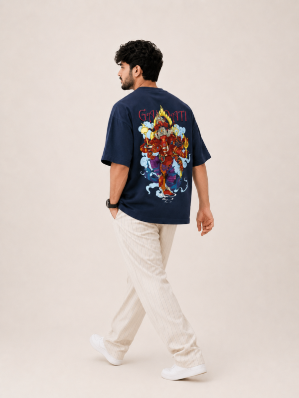 ChatGPT Image Sep 1, 2026, 03_48_48 PM Navy Blue Oversized T-Shirt for Men | Lord Ganesha Printed Graphic Tee | Ganpati Festive Streetwear | Colorful Back Artwork with Front Ganesh Motif | Half Sleeve Round Neck Casual T-Shirt