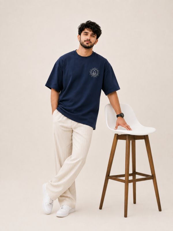 ChatGPT Image Sep 1, 2026, 03_51_19 PM Navy Blue Oversized T-Shirt for Men | Lord Ganesha Printed Graphic Tee | Ganpati Festive Streetwear | Colorful Back Artwork with Front Ganesh Motif | Half Sleeve Round Neck Casual T-Shirt