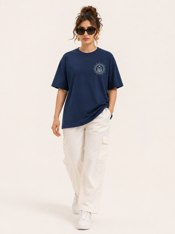 Women’s Navy Blue Oversized Lord Ganesha Printed T-Shirt, Loopknit 240 GSM Premium Fabric, Stylish Front Small Ganesha Logo & Large Colorful Back Graphic Print, Relaxed Loose Fit Half Sleeve Round Neck Graphic Tee, Trendy Spiritual Streetwear Top for Women, Casual Daily Wear, Festive Wear & Ganesh Chaturthi