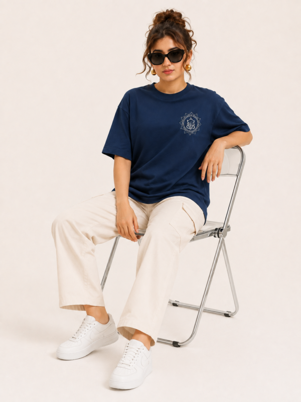 Women’s Navy Blue Oversized Lord Ganesha Printed T-Shirt, Loopknit 240 GSM Premium Fabric, Stylish Front Small Ganesha Logo & Large Colorful Back Graphic Print, Relaxed Loose Fit Half Sleeve Round Neck Graphic Tee, Trendy Spiritual Streetwear Top for Women, Casual Daily Wear, Festive Wear & Ganesh Chaturthi