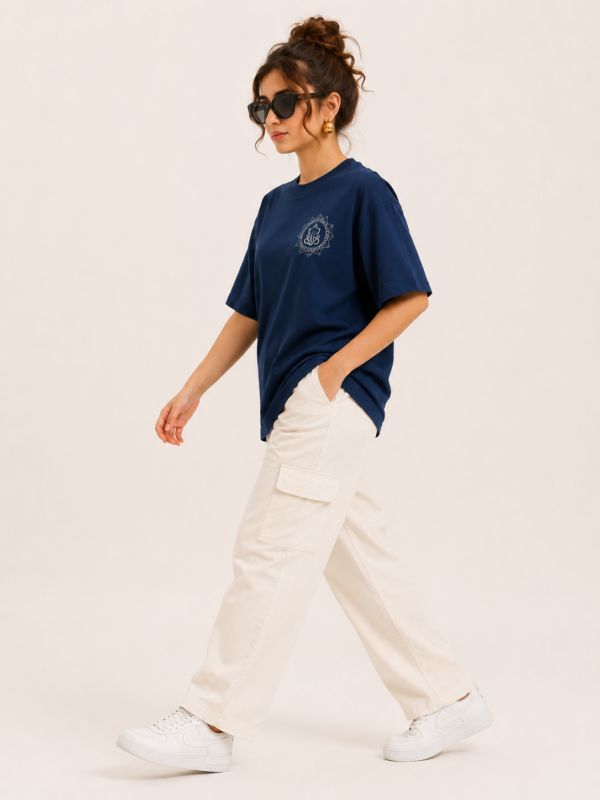 Women’s Navy Blue Oversized Lord Ganesha Printed T-Shirt, Loopknit 240 GSM Premium Fabric, Stylish Front Small Ganesha Logo & Large Colorful Back Graphic Print, Relaxed Loose Fit Half Sleeve Round Neck Graphic Tee, Trendy Spiritual Streetwear Top for Women, Casual Daily Wear, Festive Wear & Ganesh Chaturthi