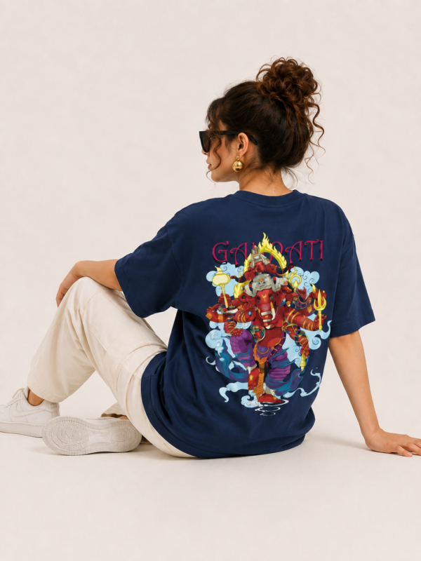 Women’s Navy Blue Oversized Lord Ganesha Printed T-Shirt, Loopknit 240 GSM Premium Fabric, Stylish Front Small Ganesha Logo & Large Colorful Back Graphic Print, Relaxed Loose Fit Half Sleeve Round Neck Graphic Tee, Trendy Spiritual Streetwear Top for Women, Casual Daily Wear, Festive Wear & Ganesh Chaturthi