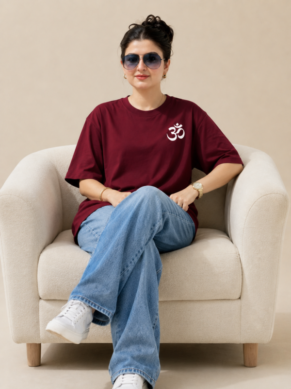 ChatGPT Image Sep 2, 2026, 10_35_30 AM Women’s Maroon Oversized T-Shirt with Lord Ganesha Back Print and Om Front Graphic, Loopknit 240 GSM Premium Fabric, Relaxed Loose Fit Half Sleeve Round Neck Casual Tee, Trendy Spiritual Streetwear Top for Women, Festive Wear, College, Outings & Everyday Styling