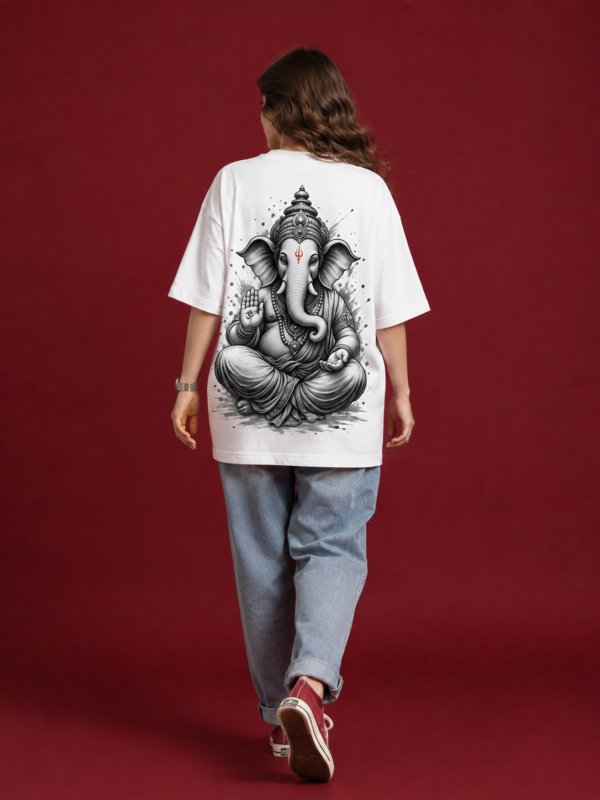 ChatGPT Image Sep 2, 2026, 10_43_47 AM Women’s White Oversized T-Shirt with Lord Ganesha Back Print & Spiritual Front Graphic, Premium Casual Loose Fit Half Sleeve Cotton Tee for Women, Trendy Streetwear Top for College, Outings, Festive Wear & Everyday Styling