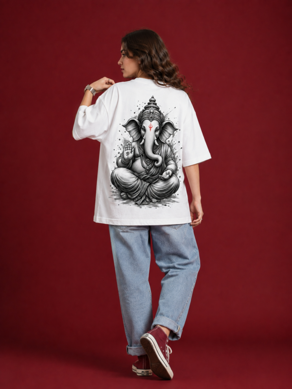 ChatGPT Image Sep 2, 2026, 10_48_48 AM Women’s White Oversized T-Shirt with Lord Ganesha Back Print & Spiritual Front Graphic, Premium Casual Loose Fit Half Sleeve Cotton Tee for Women, Trendy Streetwear Top for College, Outings, Festive Wear & Everyday Styling